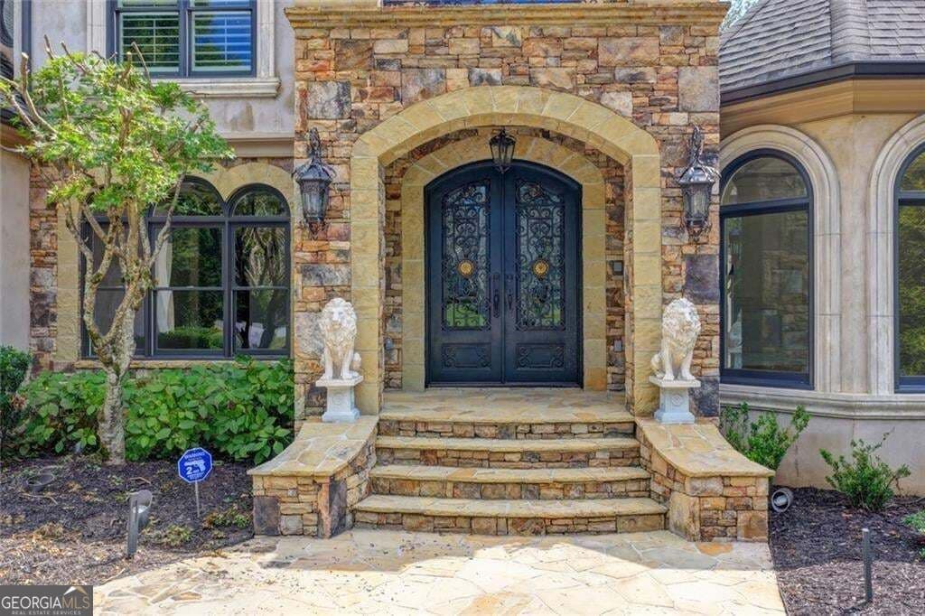 7 bedroom, 7.5 bathroom, 7,529 sq ft single family residence for sale at 810 Moss Creek Plantation, Duluth, GA 30097 — photo 2