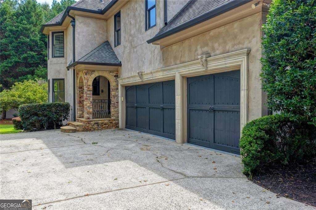 7 bedroom, 7.5 bathroom, 7,529 sq ft single family residence for sale at 810 Moss Creek Plantation, Duluth, GA 30097 — photo 3