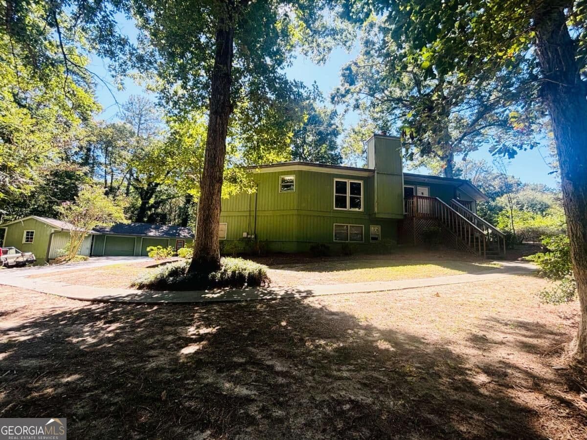 4 bedroom, 3.5 bathroom single family residence for sale at 4715 Barnes Court, Loganville, GA 30052 — photo 1 of 10