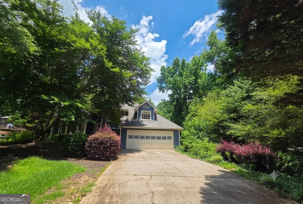 4 bedroom, 3 bathroom, 1,977 sq ft single family residence for sale at 4915 Bayberry Drive, Cumming, GA 30040 — photo 3