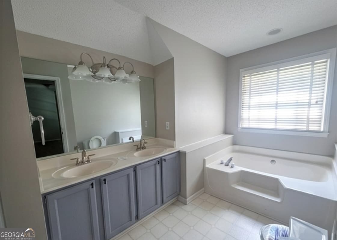 4 bedroom, 3 bathroom, 1,977 sq ft single family residence for sale at 4915 Bayberry Drive, Cumming, GA 30040 — photo 9