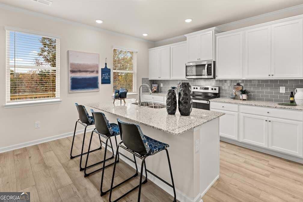 4 bedroom, 2.5 bathroom, 2,506 sq ft single family residence for sale at 8865 McKaskey Lane, Ball Ground, GA 30107 — photo 8