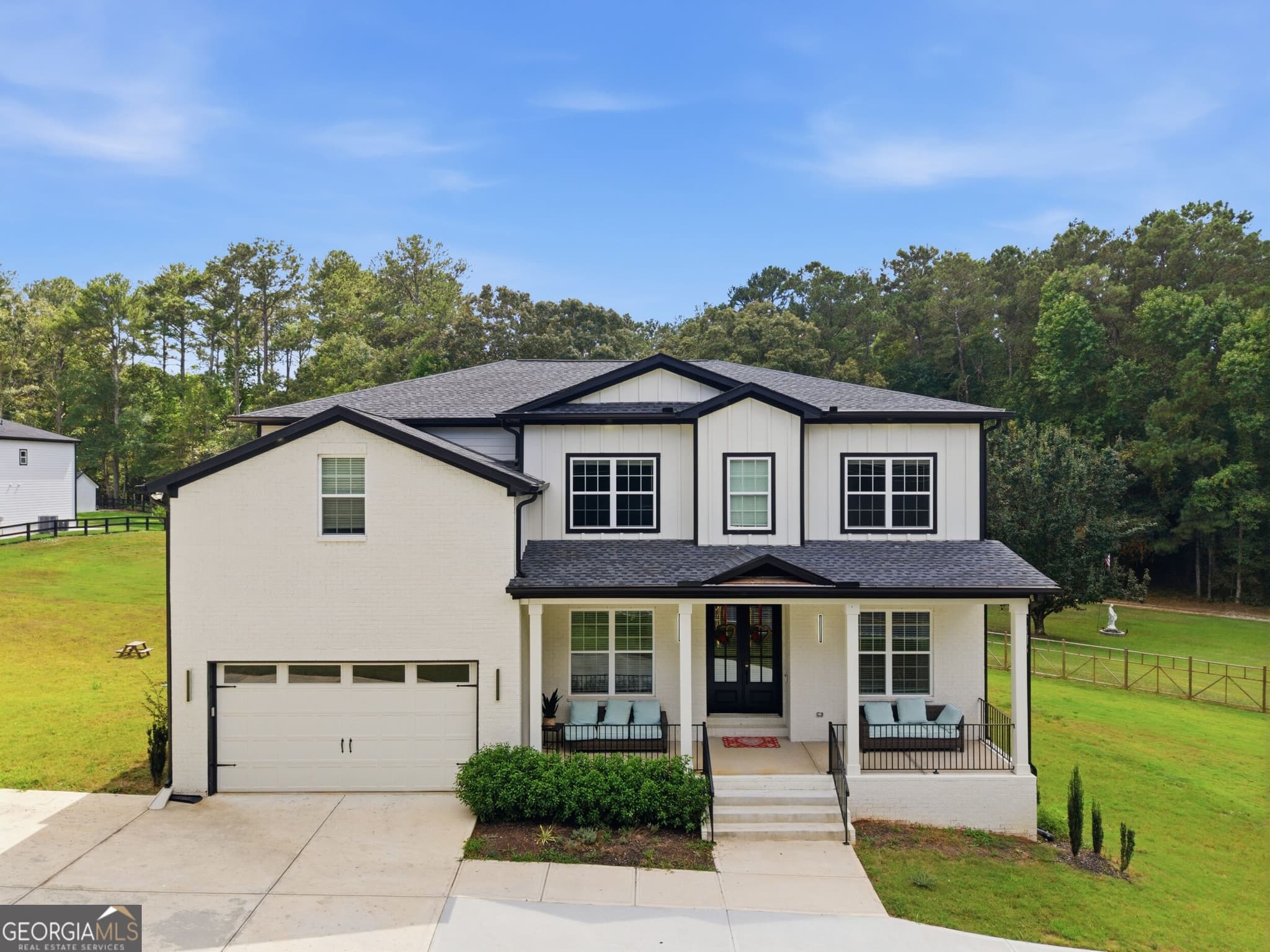 5 bedroom, 5.5 bathroom single family residence for sale at 2910 Centerville Rosebud Road, Snellville, GA 30039 — photo 2