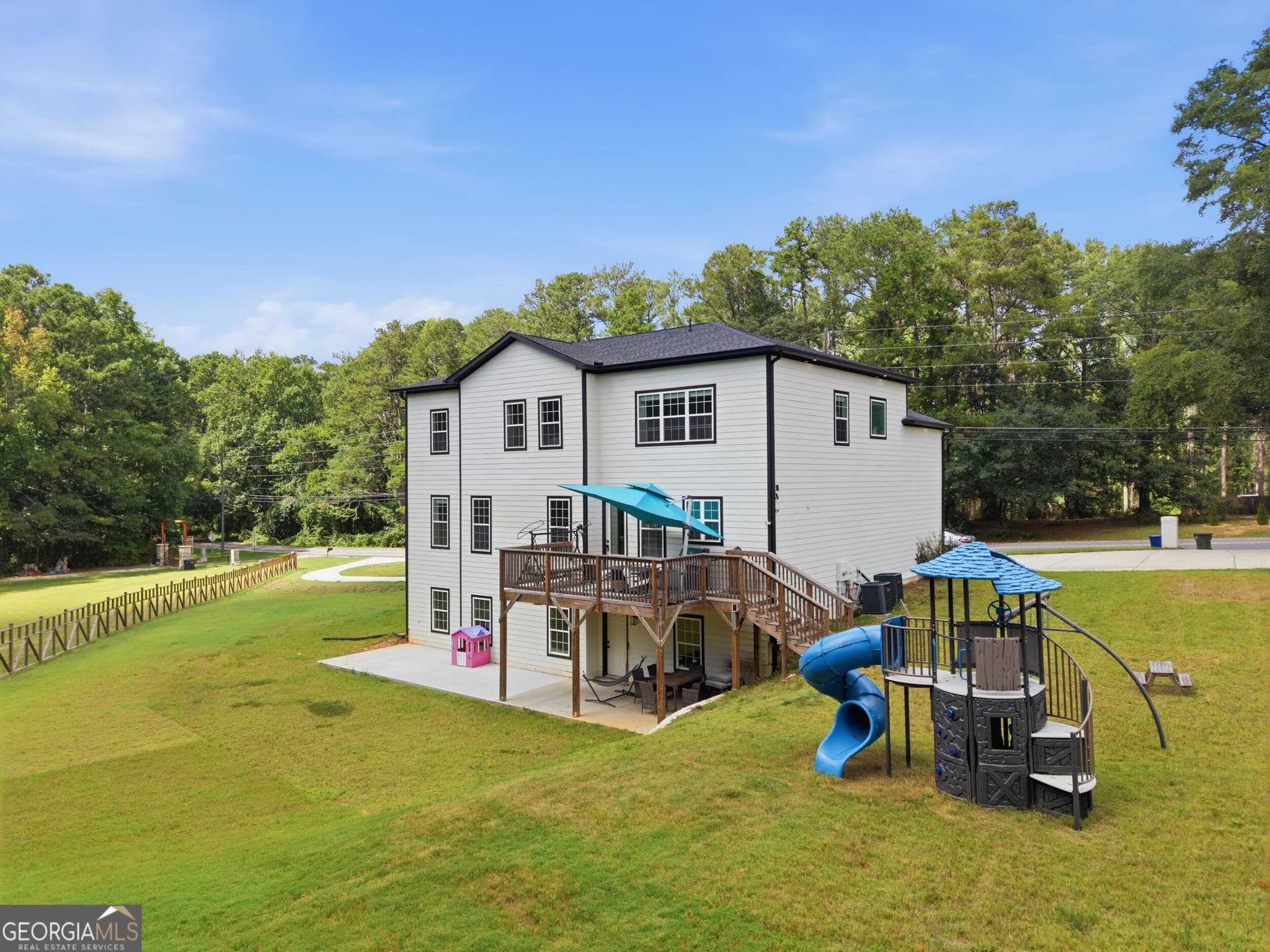 5 bedroom, 5.5 bathroom single family residence for sale at 2910 Centerville Rosebud Road, Snellville, GA 30039 — photo 4