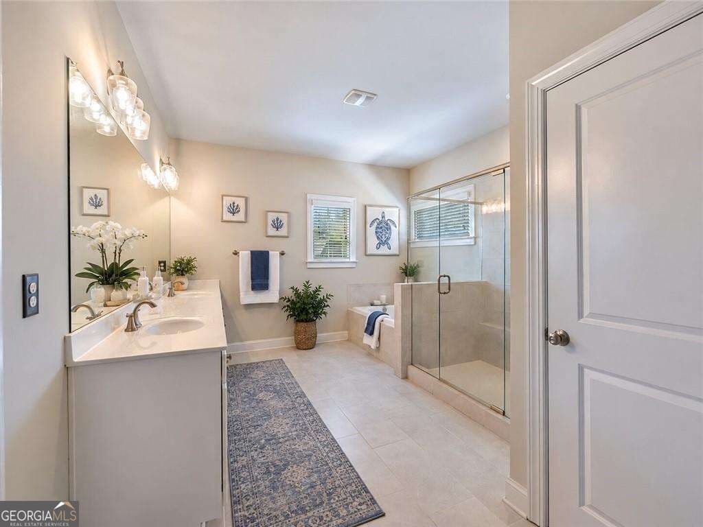 6 bedroom, 4 bathroom single family residence for sale at 6515 Yellow Birch Street, Cumming, GA 30040 — photo 10