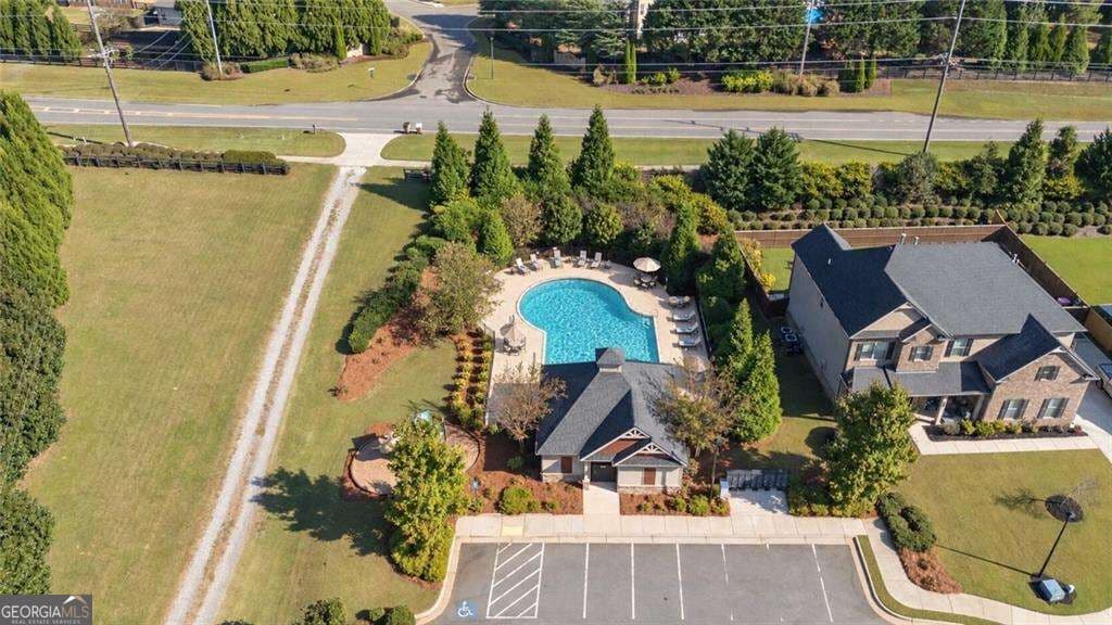 6 bedroom, 4 bathroom single family residence for sale at 6515 Yellow Birch Street, Cumming, GA 30040 — photo 4