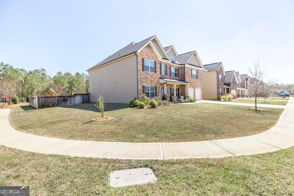 5 bedroom, 4 bathroom, 4,189 sq ft single family residence for sale at 100 Cedar Leaf Trail, Bonaire, GA 31005 — photo 4