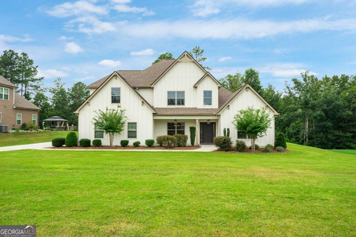 4 bedroom, 3.5 bathroom, 3,552 sq ft single family residence for sale at 4605 Diptera Lane, Fairburn, GA 30213 — photo 1 of 55