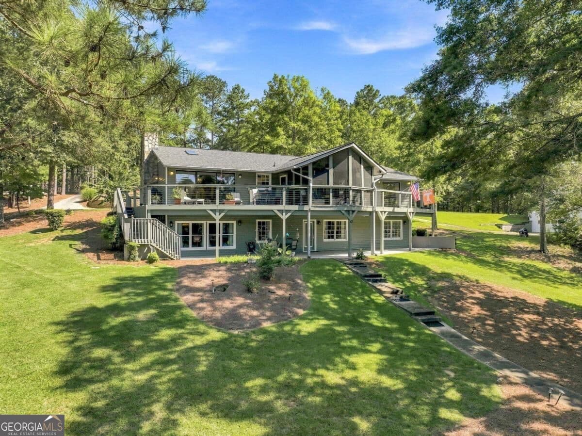 5 bedroom, 3 bathroom, 3,250 sq ft single family residence for sale at 1550 Parks Mill Drive, Greensboro, GA 30642 — photo 2