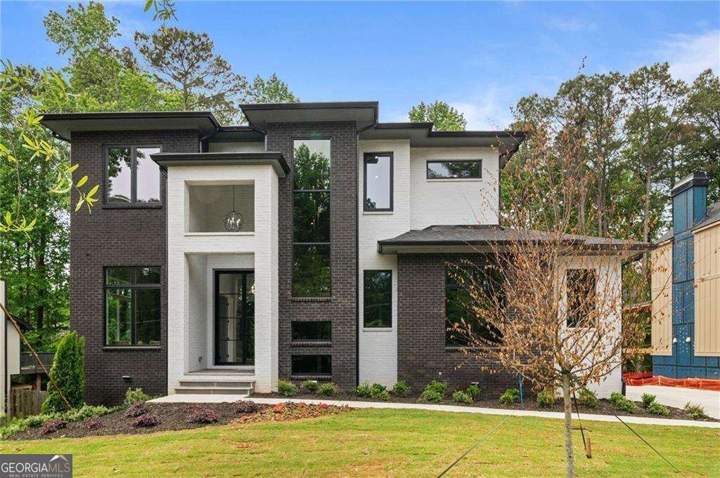 5 bedroom, 5.5 bathroom, 5,000 sq ft single family residence for sale at 447 Michael Drive, Alpharetta, GA 30009 — photo 1 of 49