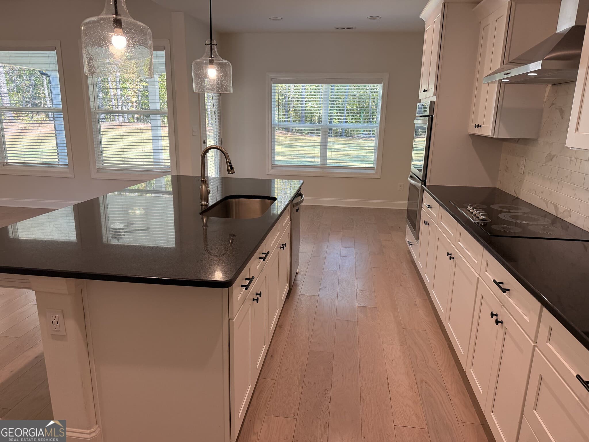 5 bedroom, 3.5 bathroom single family residence for sale at 9455 Glacial Lane, Fairburn, GA 30213 — photo 7