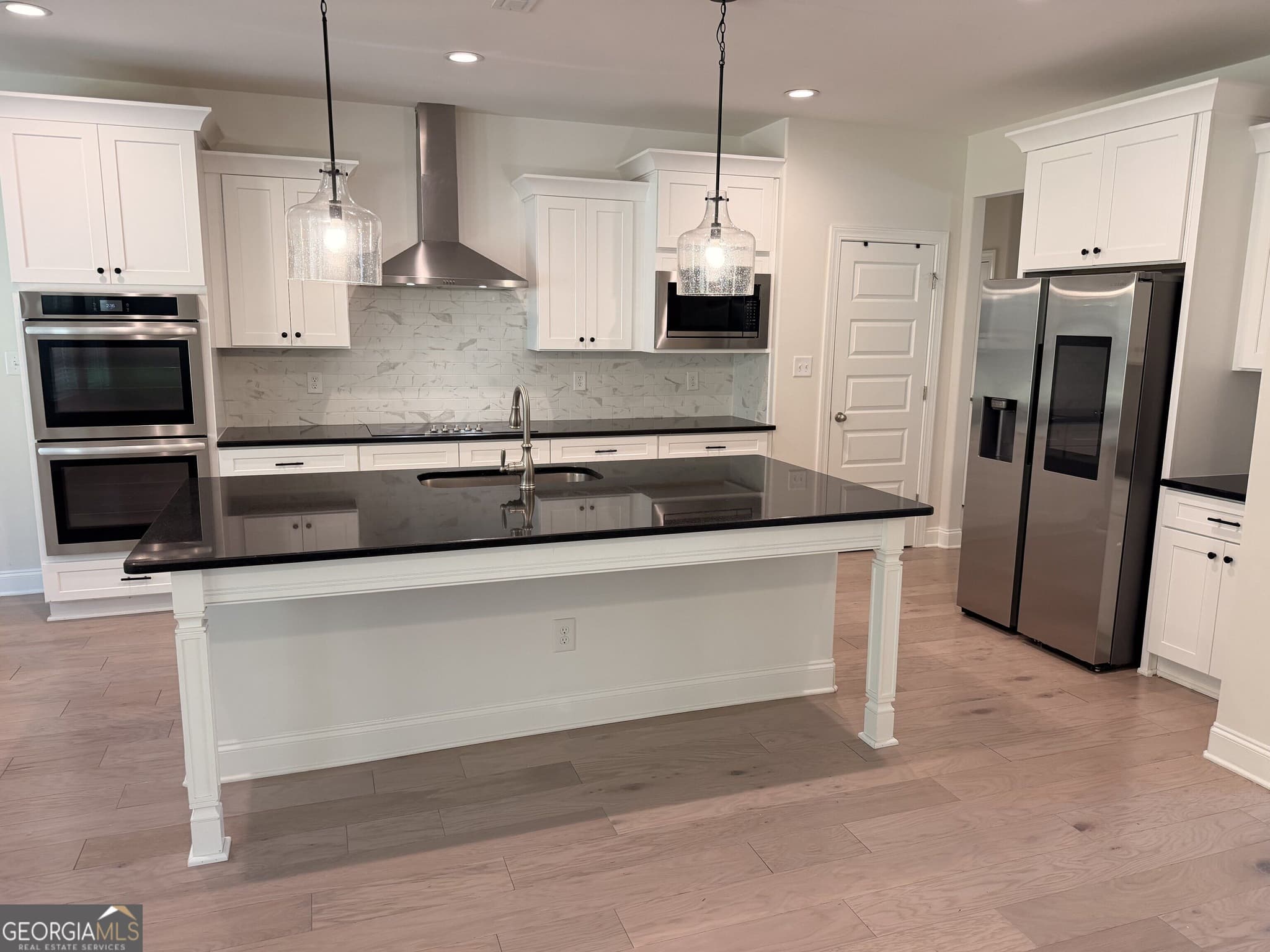 5 bedroom, 3.5 bathroom single family residence for sale at 9455 Glacial Lane, Fairburn, GA 30213 — photo 9