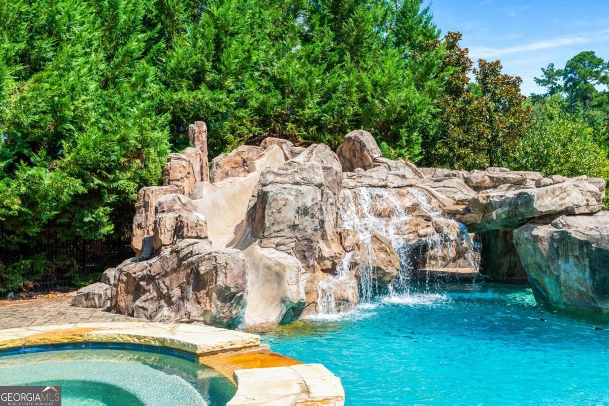 5 bedroom, 8 bathroom, 12,807 sq ft single family residence for sale at 2340 Thisel Down Drive, Statham, GA 30666 — photo 4