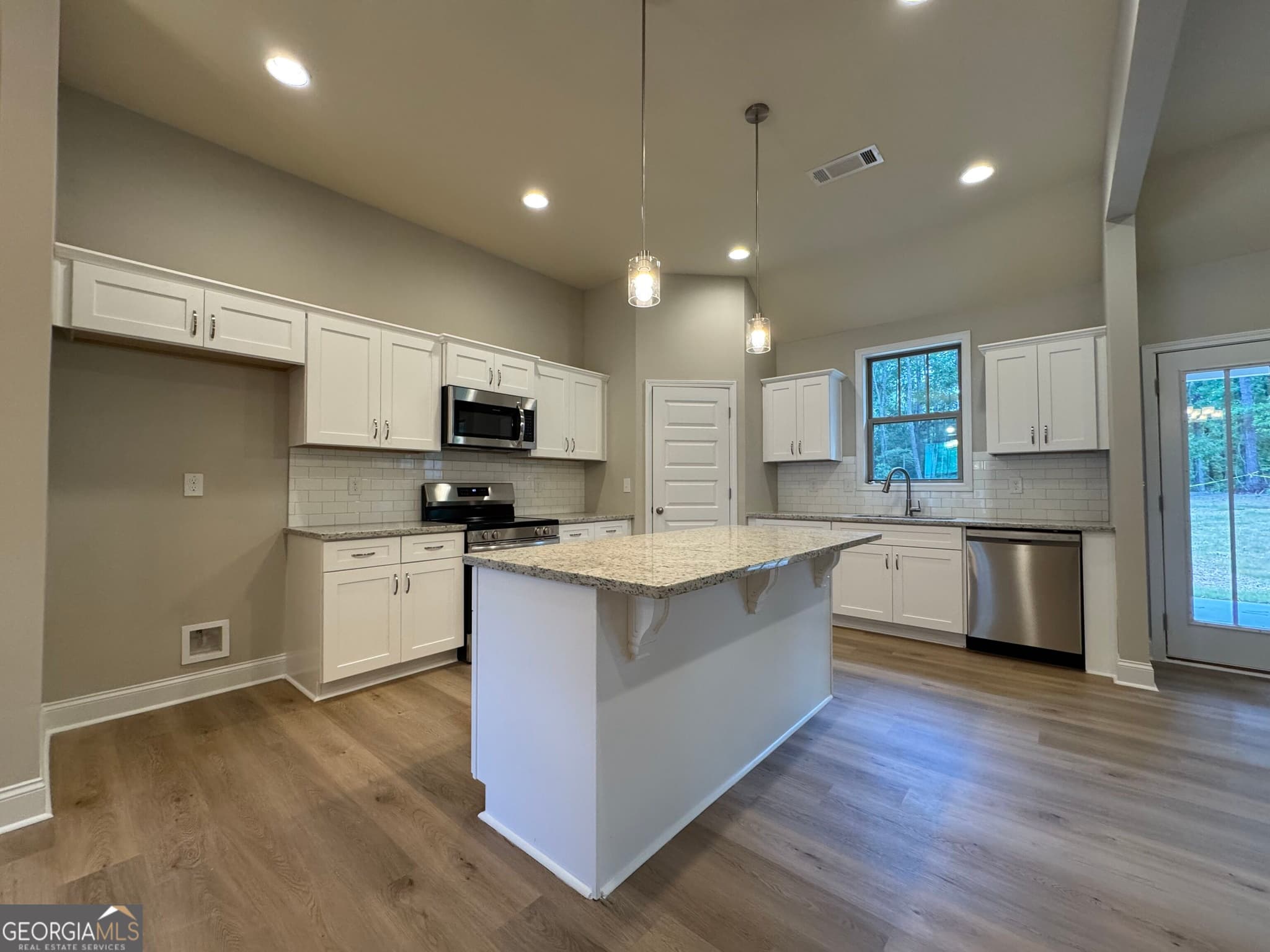 5 bedroom, 3 bathroom, 2,726 sq ft single family residence for sale at 4297 Round Stone Trail, Snellville, GA 30039 — photo 5