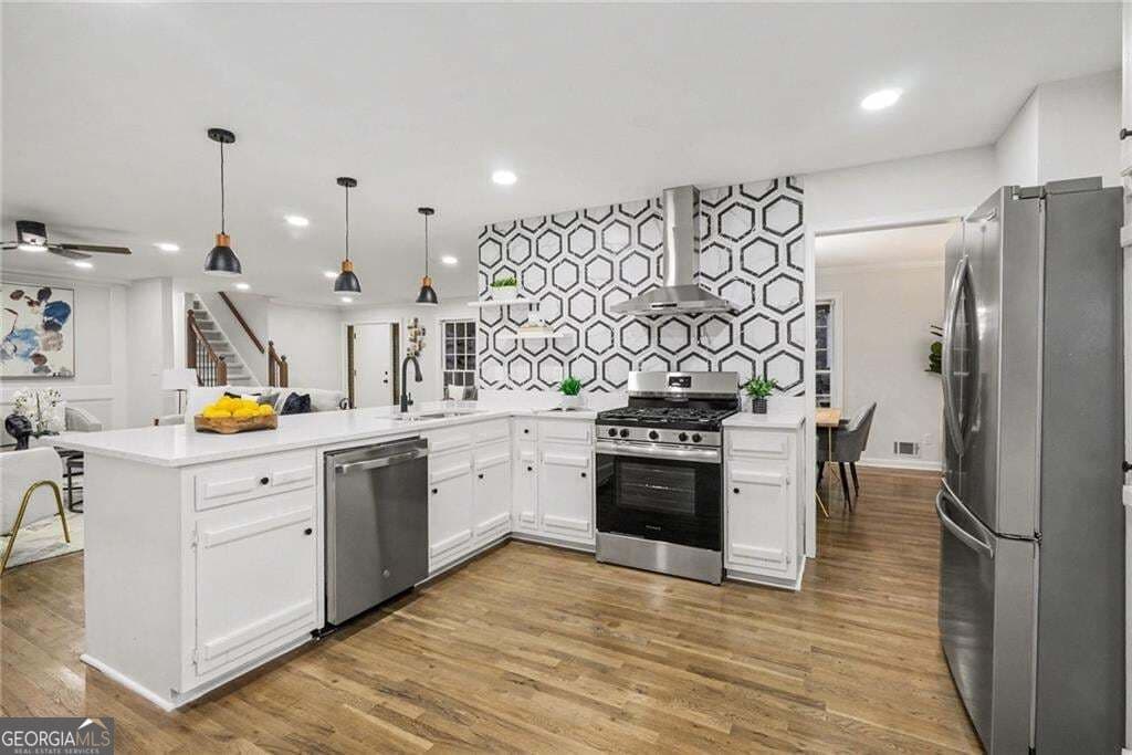 5 bedroom, 3 bathroom, 3,139 sq ft single family residence for sale at 5464 Breathitt Drive, Lilburn, GA 30047 — photo 3