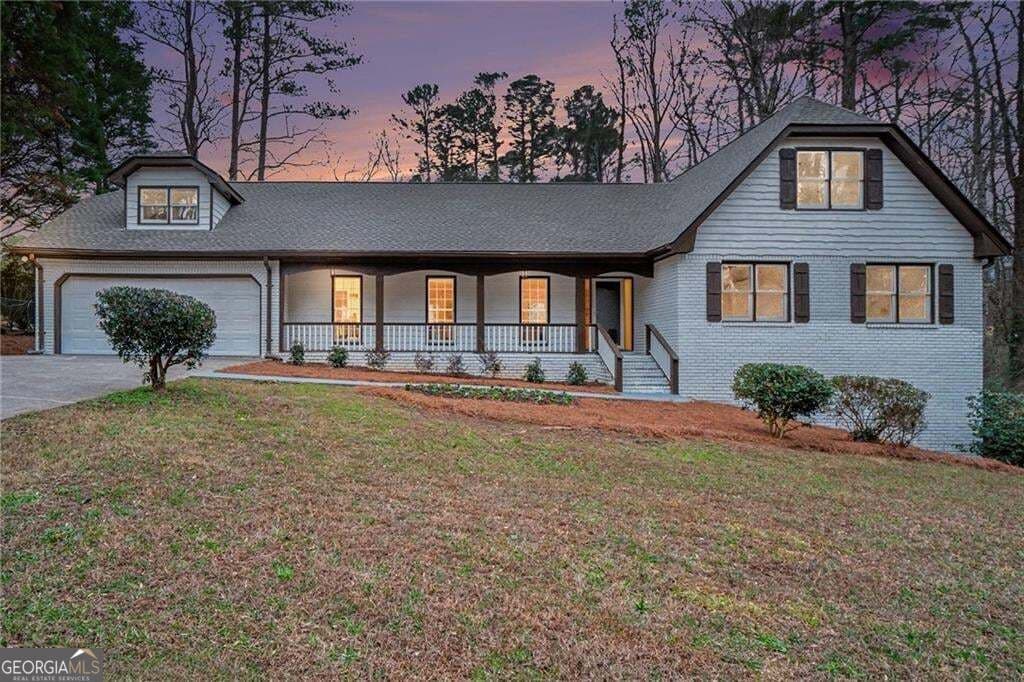 5 bedroom, 3 bathroom, 3,139 sq ft single family residence for sale at 5464 Breathitt Drive, Lilburn, GA 30047 — photo 1 of 38