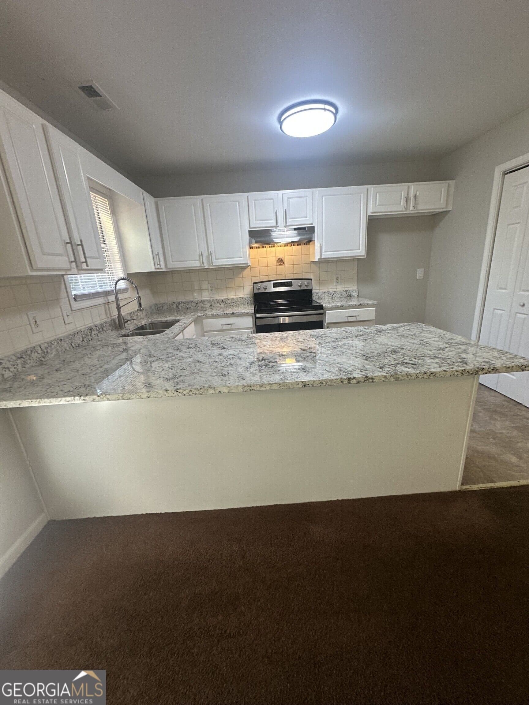 5 bedroom, 2 bathroom single family residence for sale at 1975 Hollow Trace Way, Norcross, GA 30071 — photo 6
