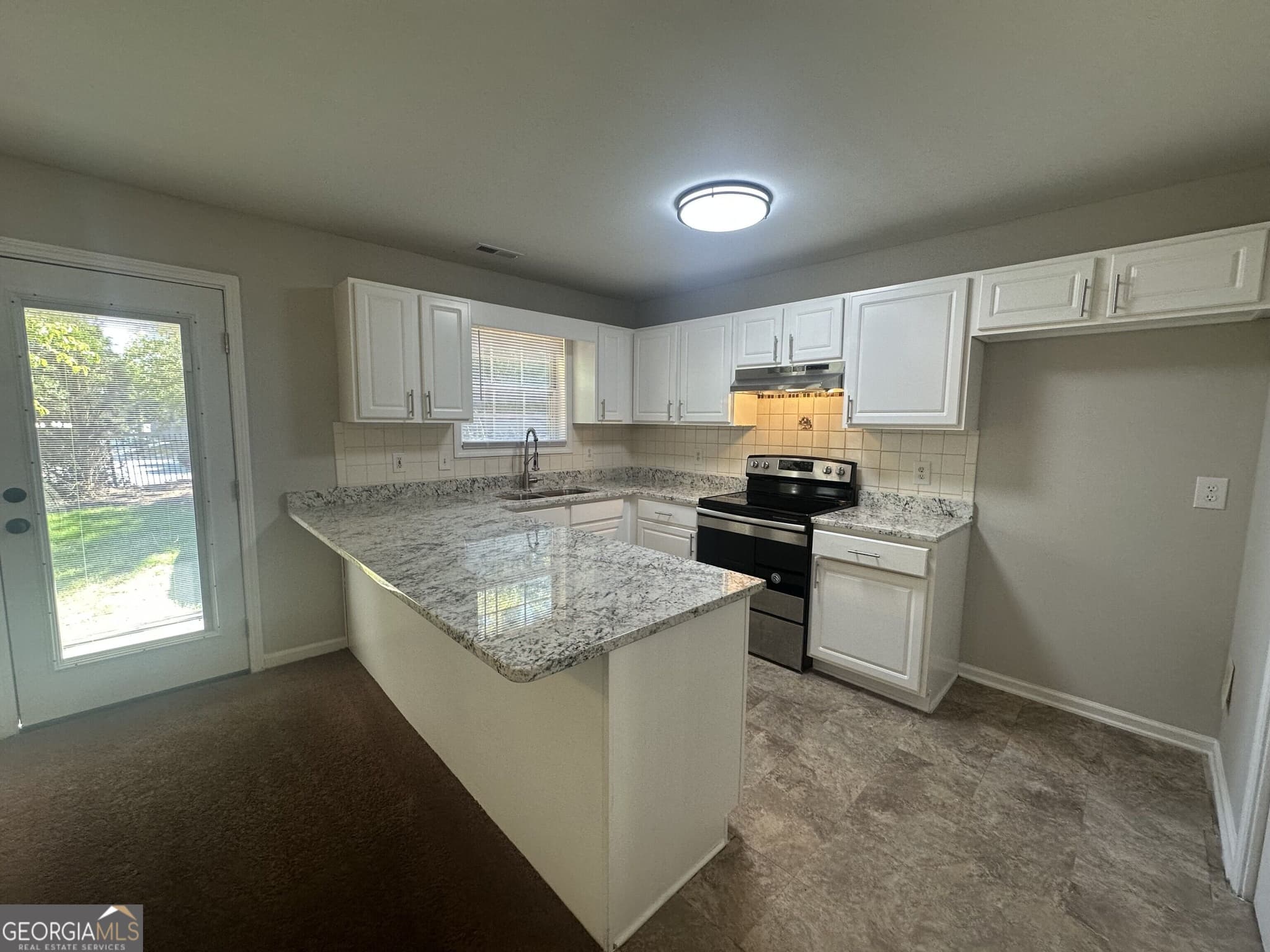 5 bedroom, 2 bathroom single family residence for sale at 1975 Hollow Trace Way, Norcross, GA 30071 — photo 5