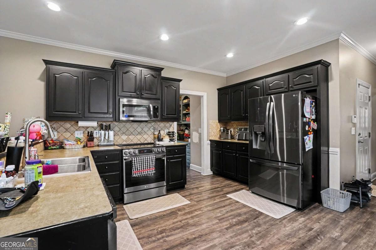 5 bedroom, 3.5 bathroom, 4,340 sq ft single family residence for sale at 521 Richmond Place, Loganville, GA 30052 — photo 8