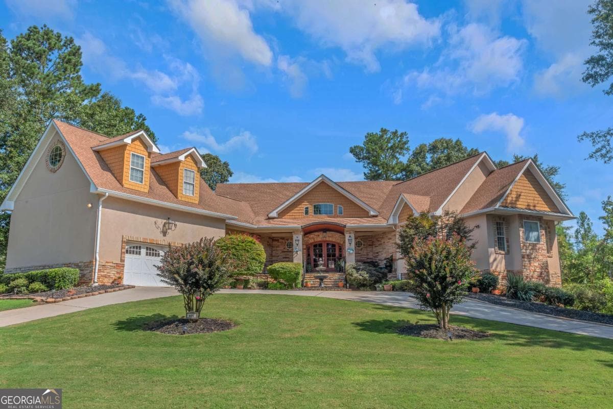 6 bedroom, 5.5 bathroom, 6,538 sq ft single family residence for sale at 601 Sawgrass Walk, Mcdonough, GA 30253 — photo 2