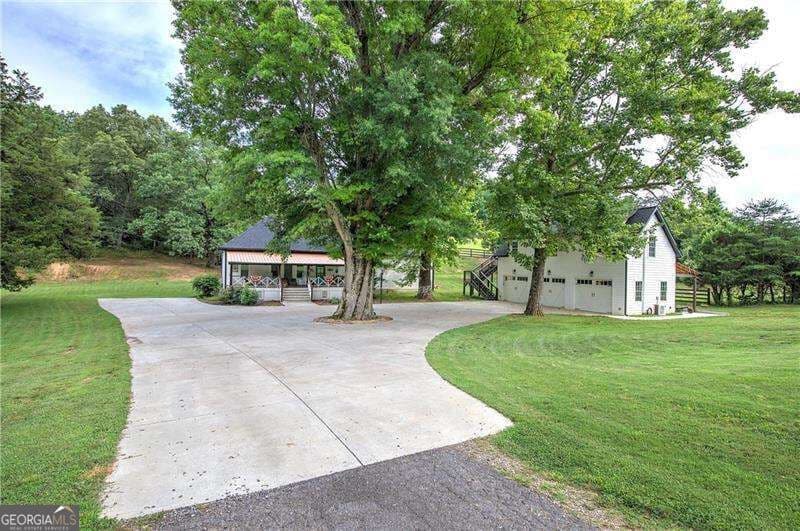 3 bedroom, 2 bathroom, 2,310 sq ft single family residence for sale at 182 Henry Mack Hill Road, Rydal, GA 30171 — photo 1 of 100