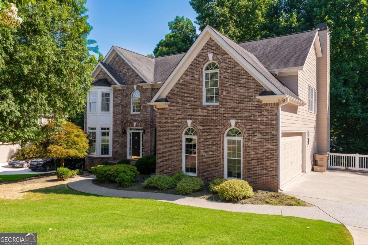 4 bedroom, 3.5 bathroom, 3,032 sq ft single family residence for sale at 716 Settlers Crossing, Canton, GA 30114 — photo 2
