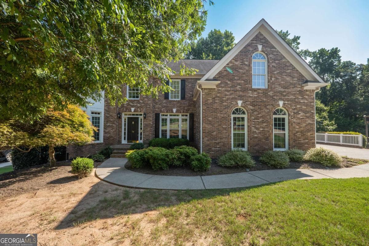 4 bedroom, 3.5 bathroom, 3,032 sq ft single family residence for sale at 716 Settlers Crossing, Canton, GA 30114 — photo 4