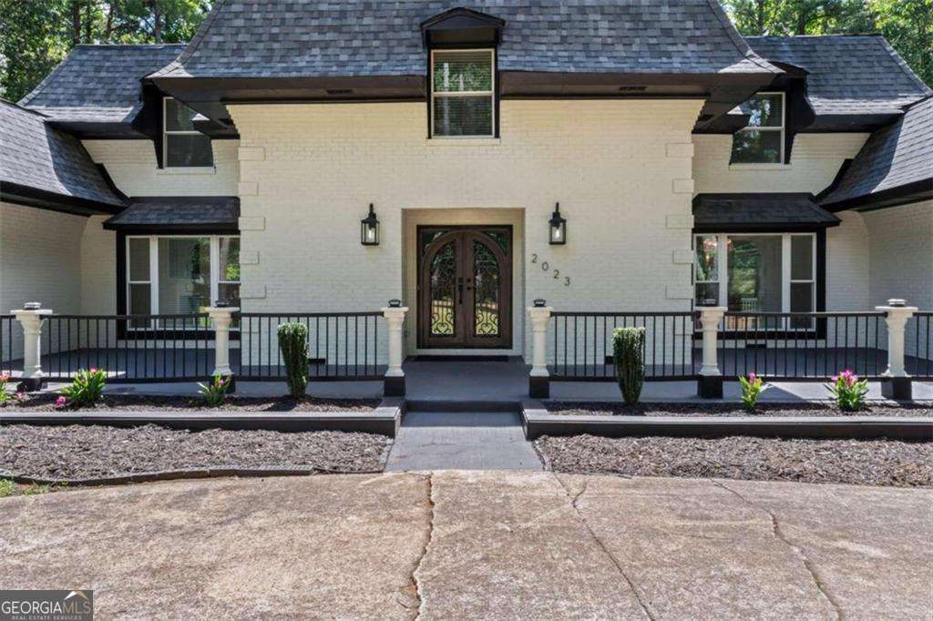 5 bedroom, 5.5 bathroom, 5,339 sq ft single family residence for sale at 2023 Stoneleigh Drive, Stone Mountain, GA 30087 — photo 2