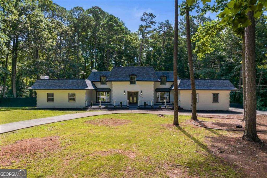 5 bedroom, 5.5 bathroom, 5,339 sq ft single family residence for sale at 2023 Stoneleigh Drive, Stone Mountain, GA 30087 — photo 1 of 60