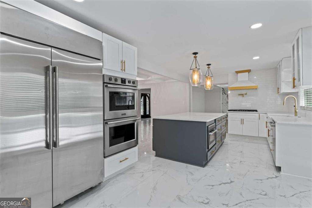 5 bedroom, 5.5 bathroom, 5,339 sq ft single family residence for sale at 2023 Stoneleigh Drive, Stone Mountain, GA 30087 — photo 9