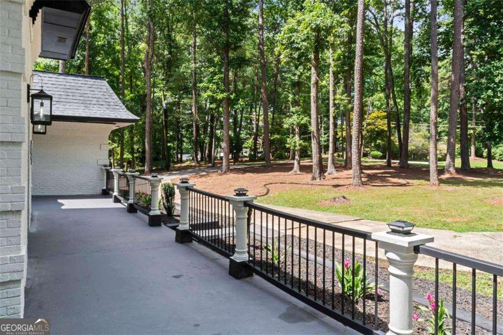 5 bedroom, 5.5 bathroom, 5,339 sq ft single family residence for sale at 2023 Stoneleigh Drive, Stone Mountain, GA 30087 — photo 4