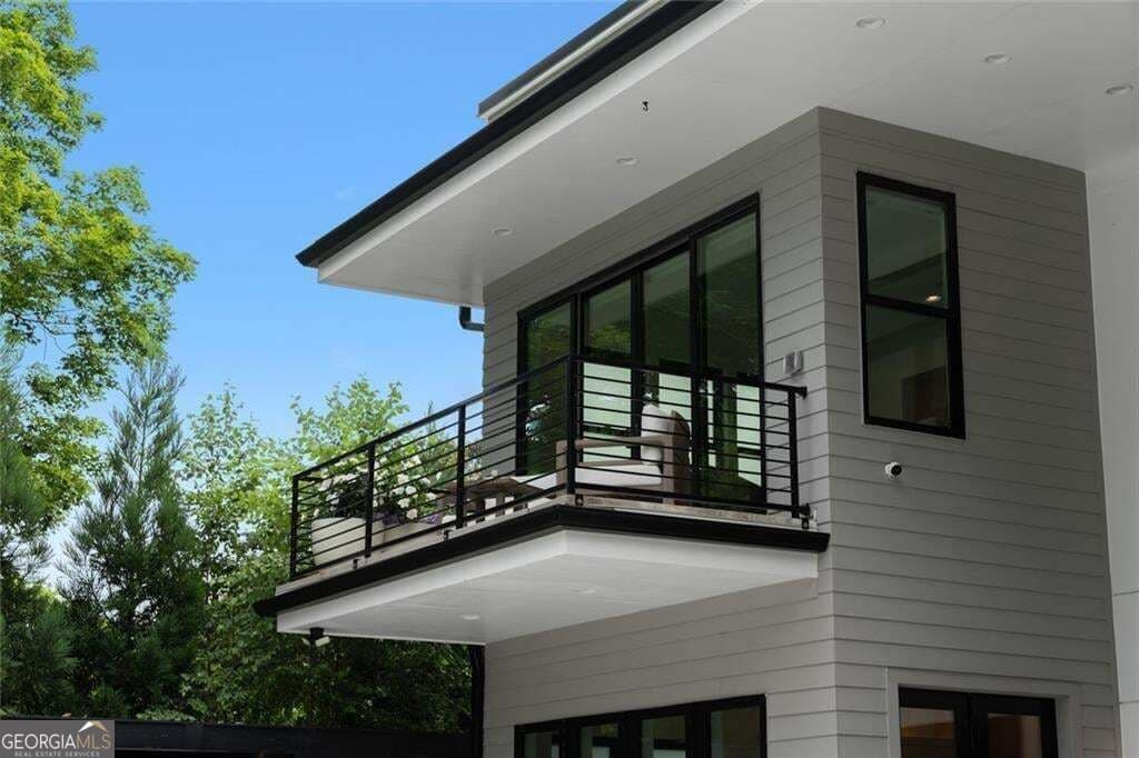 6 bedroom, 5 bathroom, 12,490 sq ft single family residence for sale at 4063 Rickenbacker Drive, Atlanta, GA 30342 — photo 2