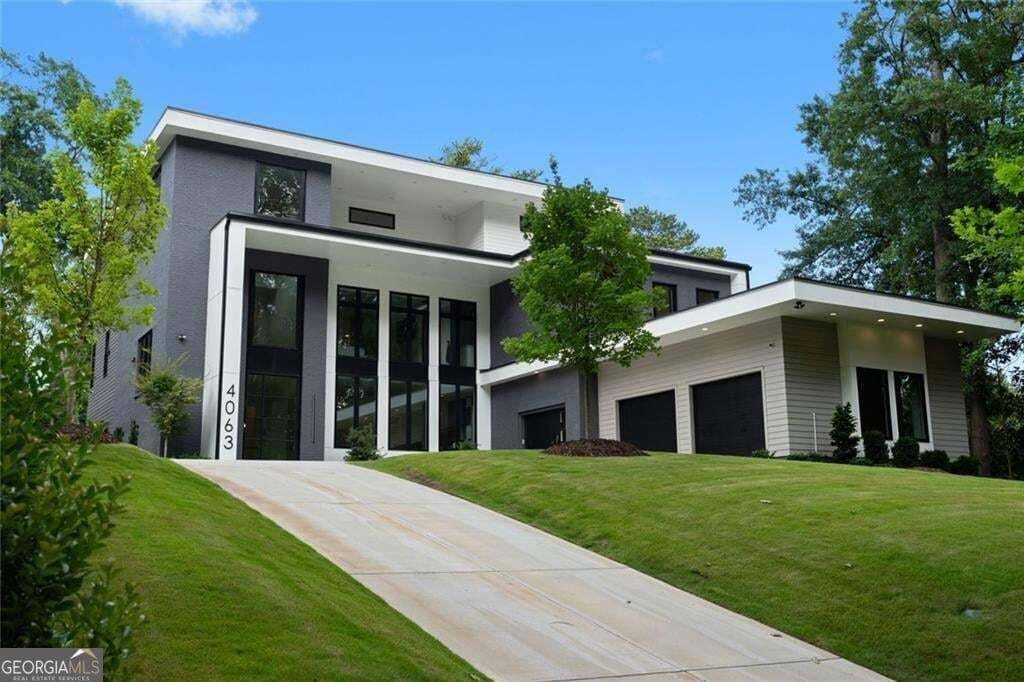6 bedroom, 5 bathroom, 12,490 sq ft single family residence for sale at 4063 Rickenbacker Drive, Atlanta, GA 30342 — photo 1 of 58