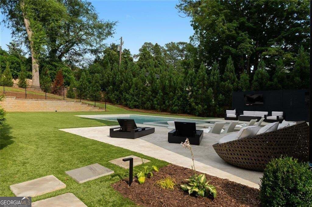 6 bedroom, 5 bathroom, 12,490 sq ft single family residence for sale at 4063 Rickenbacker Drive, Atlanta, GA 30342 — photo 5