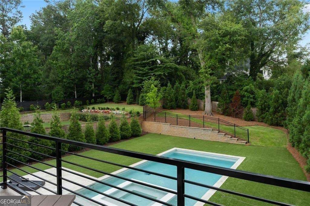 6 bedroom, 5 bathroom, 12,490 sq ft single family residence for sale at 4063 Rickenbacker Drive, Atlanta, GA 30342 — photo 4