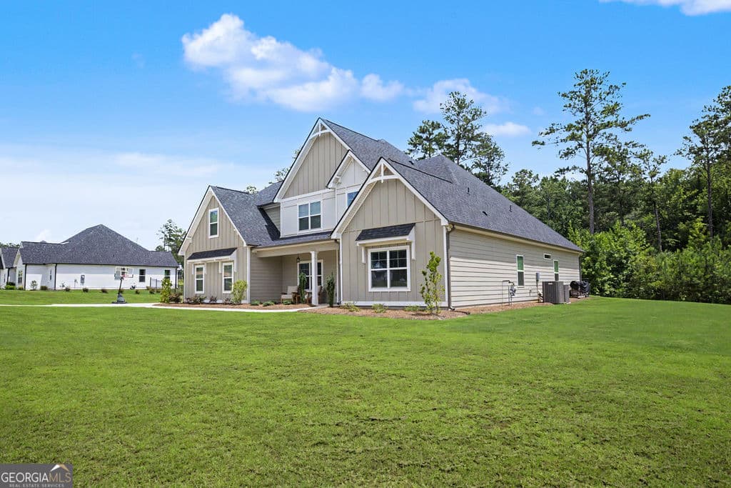 5 bedroom, 4.5 bathroom, 4,260 sq ft single family residence for sale at 400 Atlantica Drive, Newnan, GA 30263 — photo 2