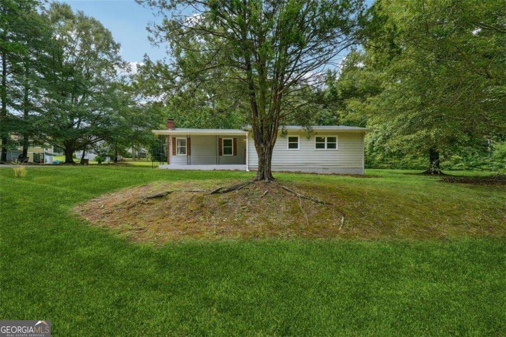4 bedroom, 2 bathroom, 1,424 sq ft single family residence for rent at 309 Cowan Road, Conyers, GA 30094 for $1,750 a month — photo 2