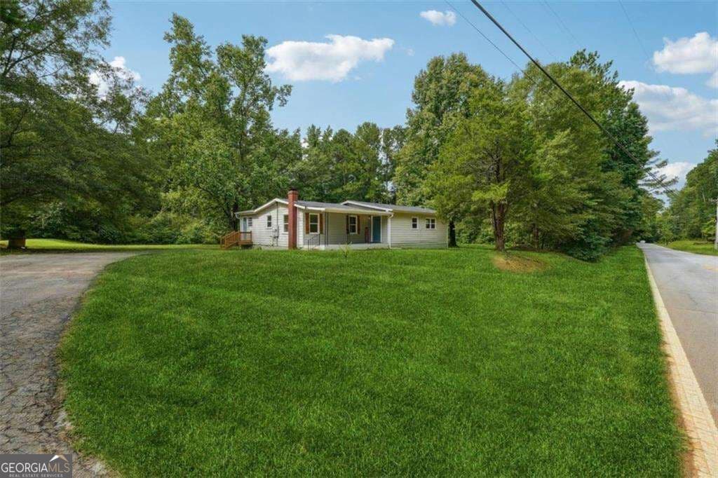 4 bedroom, 2 bathroom, 1,424 sq ft single family residence for rent at 309 Cowan Road, Conyers, GA 30094 for $1,750 a month — photo 3