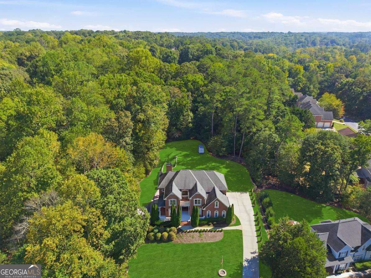 5 bedroom, 6.5 bathroom, 7,360 sq ft single family residence for sale at 2650 Riverfront Drive, Snellville, GA 30039 — photo 2