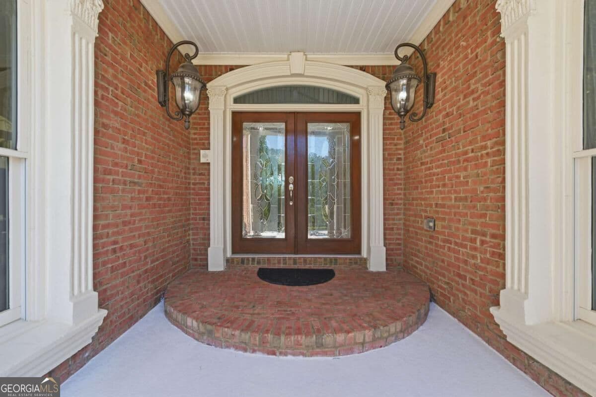 5 bedroom, 6.5 bathroom, 7,360 sq ft single family residence for sale at 2650 Riverfront Drive, Snellville, GA 30039 — photo 6
