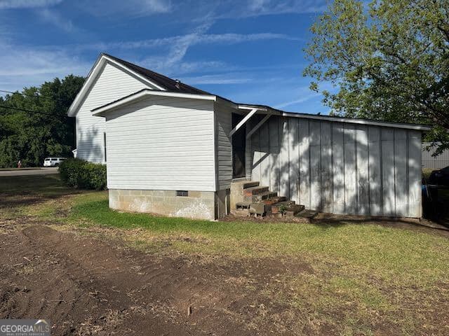 3 bedroom, 2 bathroom, 1,442 sq ft single family residence for sale at 319 E McCarty Street, Sandersville, GA 31082 — photo 6