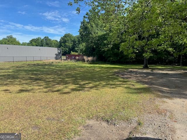 3 bedroom, 2 bathroom, 1,442 sq ft single family residence for sale at 319 E McCarty Street, Sandersville, GA 31082 — photo 3