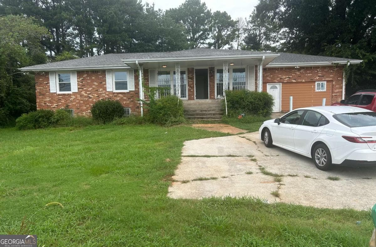 6 bedroom, 3 bathroom, 2,850 sq ft single family residence for rent at 4798 Rockbridge Road, Stone Mountain, GA 30083 for $2,000 a month — photo 1 of 1