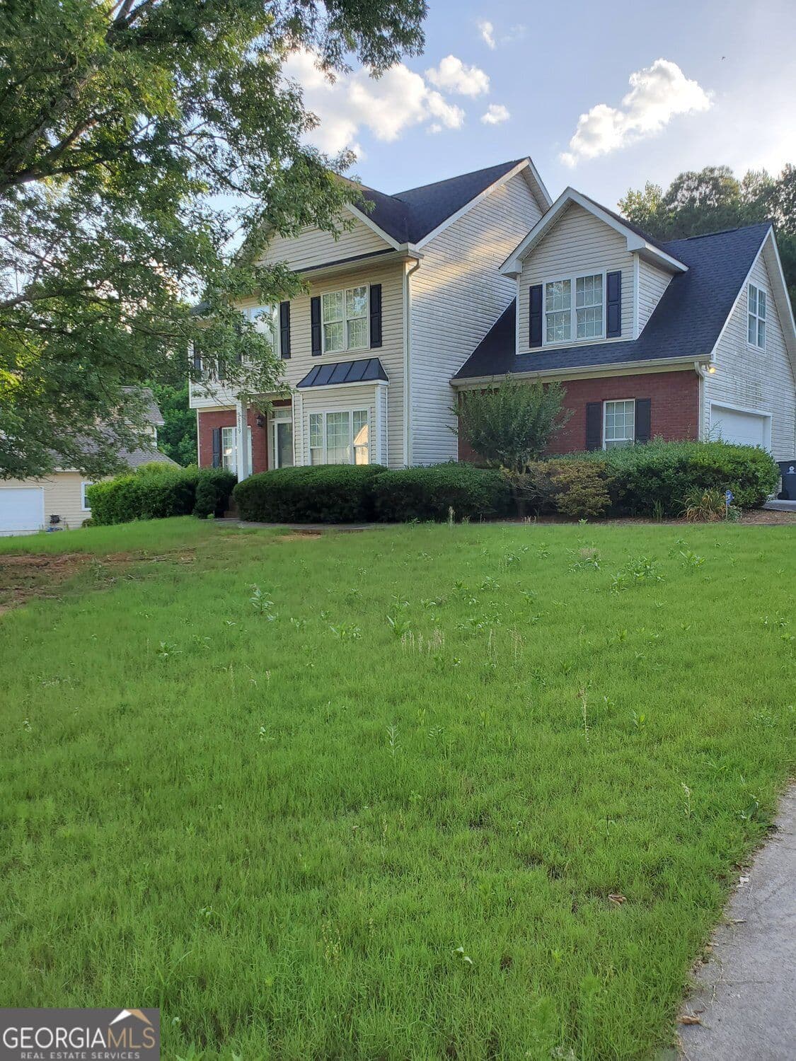 4 bedroom, 3.5 bathroom, 2,627 sq ft single family residence for sale at 3819 Martingale Drive, Conyers, GA 30094 — photo 2