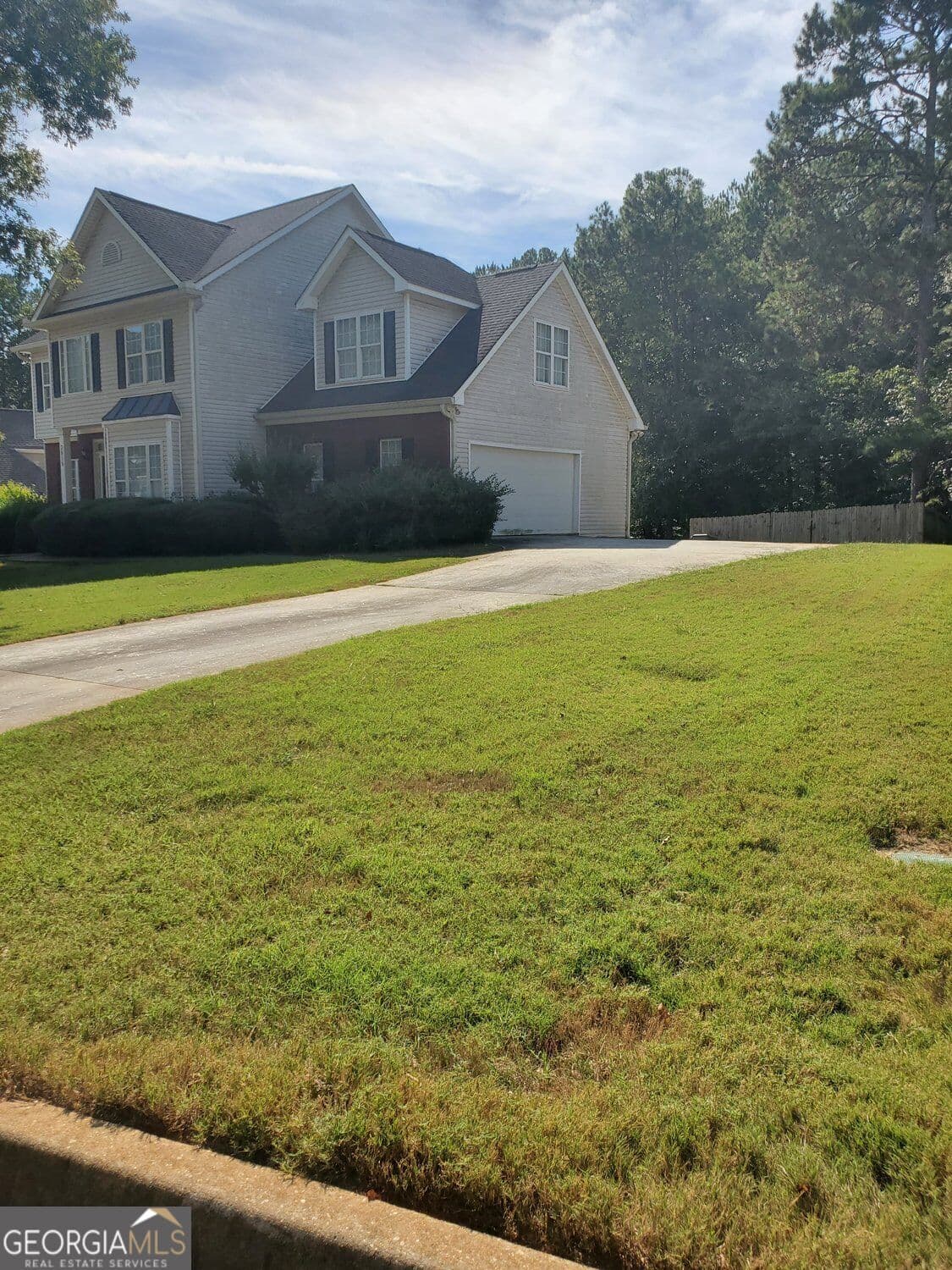 4 bedroom, 3.5 bathroom, 2,627 sq ft single family residence for sale at 3819 Martingale Drive, Conyers, GA 30094 — photo 3