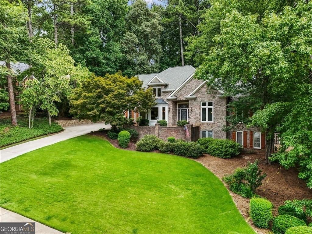4 bedroom, 4.5 bathroom, 6,152 sq ft single family residence for sale at 2919 Mountain Trace, Roswell, GA 30075