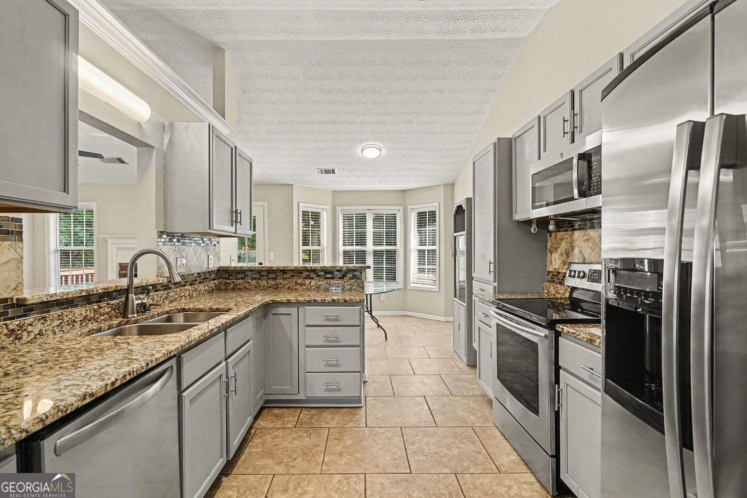 5 bedroom, 3 bathroom, 2,500 sq ft single family residence for sale at 524 Martin Forest Lane, Lawrenceville, GA 30045 — photo 3