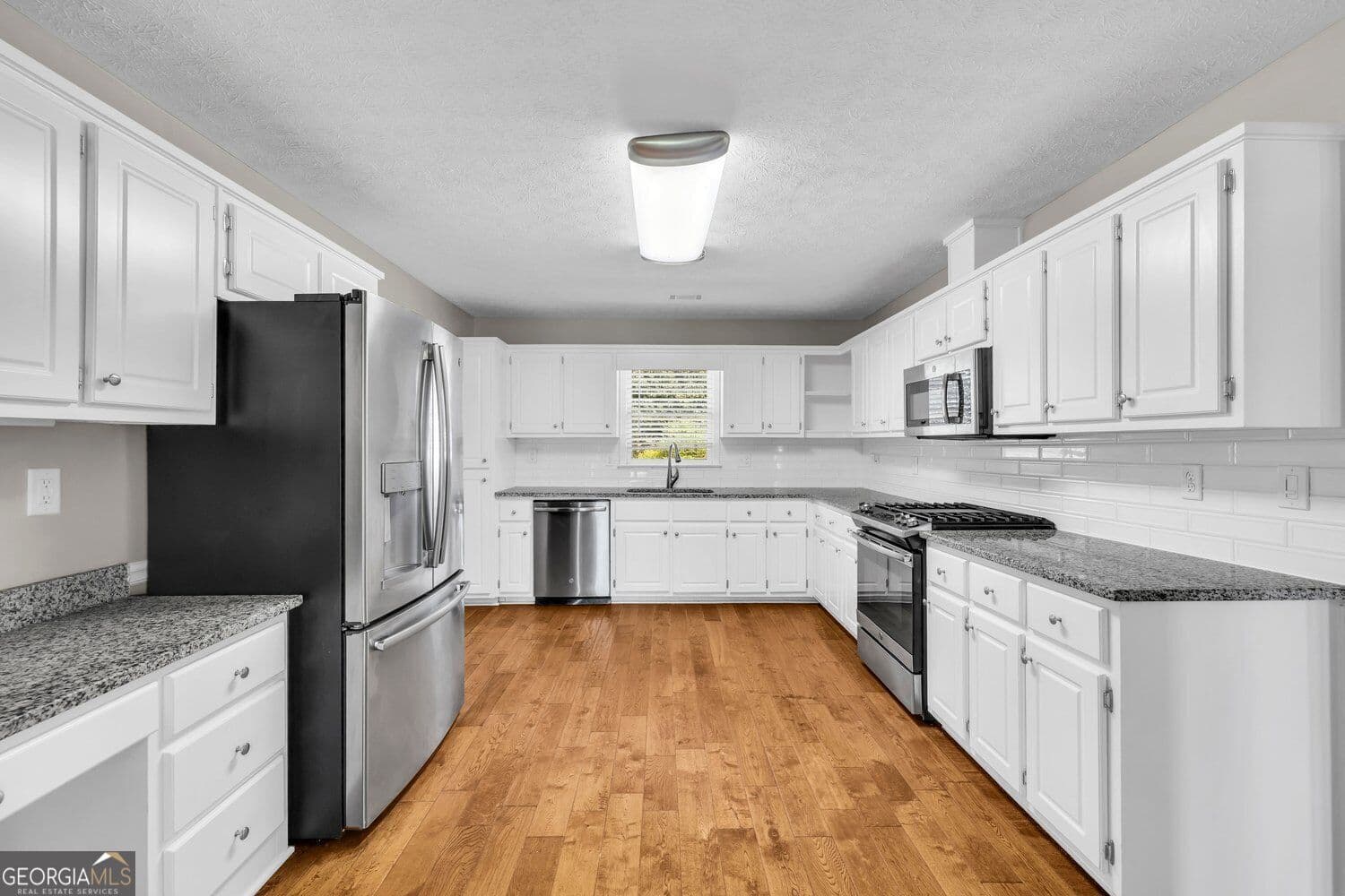 3 bedroom, 2 bathroom, 2,211 sq ft single family residence for sale at 419 Freedom Drive, Mcdonough, GA 30252 — photo 7