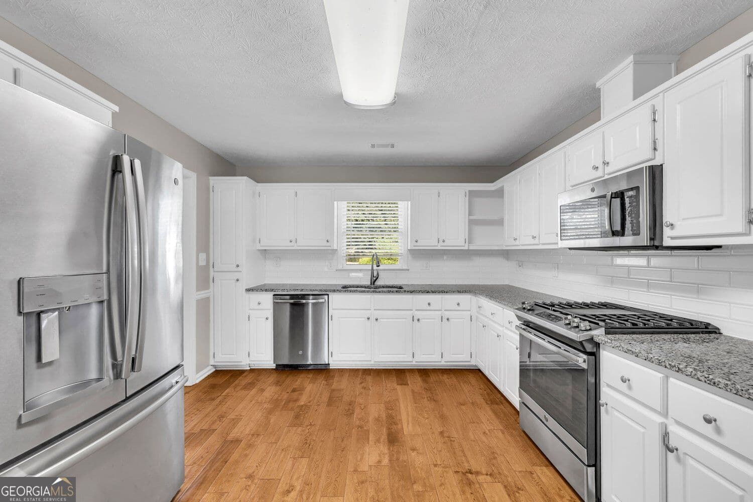 3 bedroom, 2 bathroom, 2,211 sq ft single family residence for sale at 419 Freedom Drive, Mcdonough, GA 30252 — photo 10