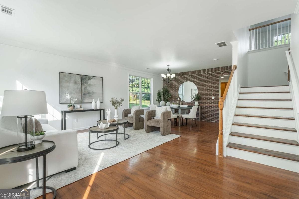 4 bedroom, 2.5 bathroom, 3,512 sq ft single family residence for sale at 1214 Loowit Falls Court, Braselton, GA 30517 — photo 5